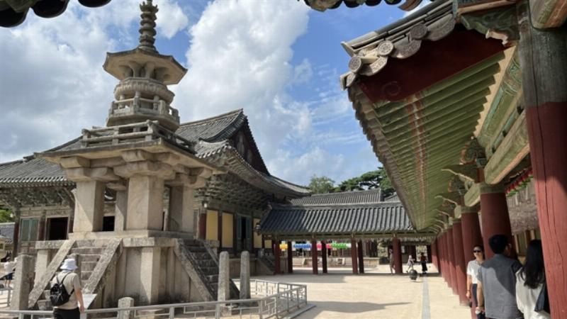 High-rise buildings and modern infrastructure in a major Vietnamese city symbolizing economic prosperity