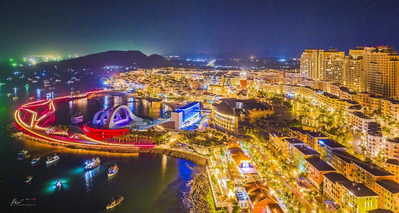 A collection of luxury vehicles on a city street in Vietnam symbolizing affluence and high status